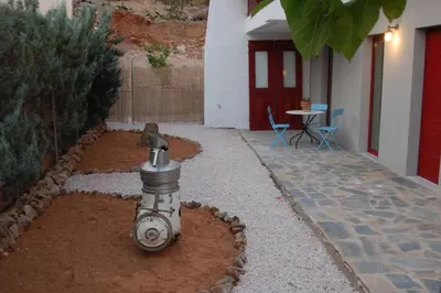 a fire hydrant in the yard of a house at Aegean Pearl in Áyios Dhimítrios