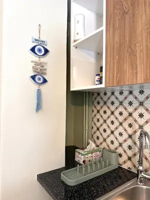 a kitchen with a sink and a refrigerator at Panathenaic Stadium area Model Cozy Studio B in Athens