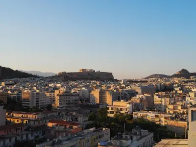 a view of the city of athens at sunset at Athens Pearl in Athens