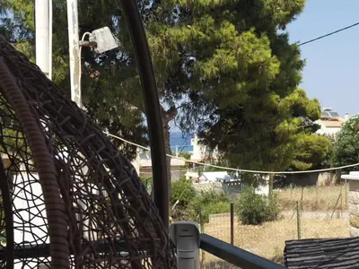 a monkey on a merry go round at a roller coaster at Chara's Luxury Home in Vravrona