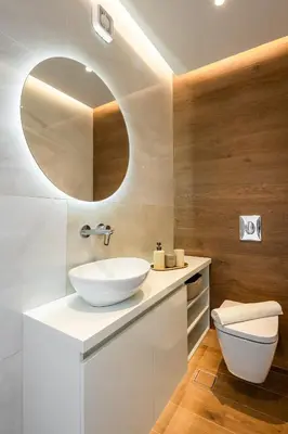 a bathroom with a white sink and a mirror at City Lights Residence Psyxiko in Athens