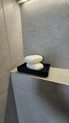 a white vase sitting on top of a counter at Her Luxury Apartment in Athens