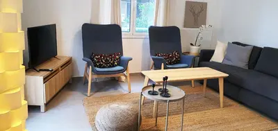 a living room with a couch and two chairs and a table at Condo, Hilton & Caravel area, Athens Center in Athens