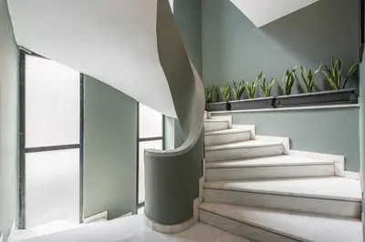 a staircase in a room with potted plants at Urban Couples Retreat With Rooftop Access - Zen Selene By Tessera in Athens