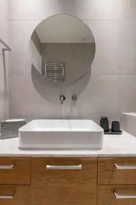 a bathroom with a white sink and a mirror at The HostMaster WiseView Celeste in Athens