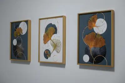 four framed pictures of leaves on a wall at Unique & Stylish Living in Kipseli in Athens