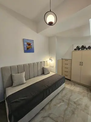 a bedroom with a large bed in a room at Keti's Elite in Athens