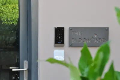 a door with a sign that reads the bloomard at The BloomYard in Markopoulo