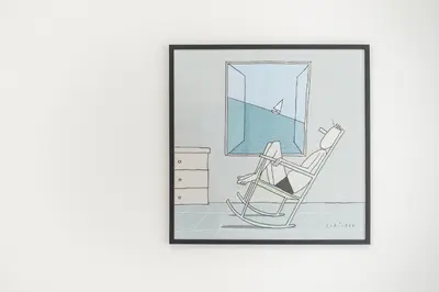 a woman sitting in a chair in a room at Peaceful Couples Apartment & Rooftop Access - Zen Hebe By Tessera in Athens