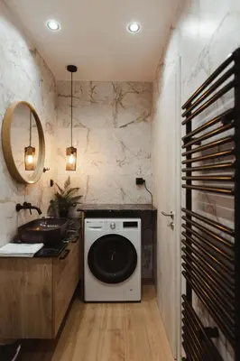 a washing machine in a bathroom with a sink at Irida apartment in Athens