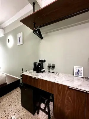 a room with a counter and a bed in a room at Aura, Sis Urban Apartments III in Athens
