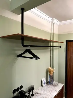 a kitchen with a shelf hanging from the ceiling at Aura, Sis Urban Apartments III in Athens