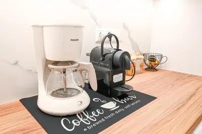 a coffee maker sitting on top of a counter at Koukaki Modern Living in Athens