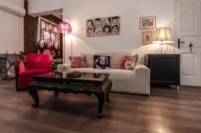 a living room with a couch and a coffee table at Athens Serenity in Athens