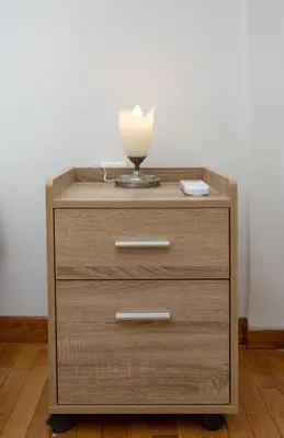 a wooden dresser with a lamp on top of it at Spacious 3 Bedroom Apartment With Large Balcony in Athens
