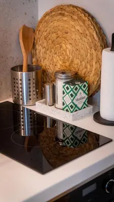 a basket on top of a counter with a wicker basket at Stylish apartment with large terrace in Athens