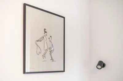 a drawing of a man and a woman on a wall at Spacious Couples Studio with Seating Area & Rooftop Vibes Zen Gaia By Tessera in Athens