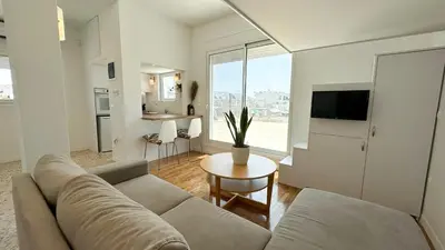 a living room with a couch and a table at 360 Athens Rooftop Nest, 300m from Metro Station, Acropolis View in Athens