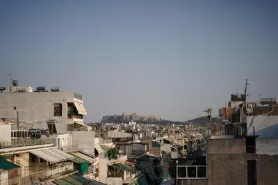 an overhead view of a city with buildings at 360 Athens Rooftop Nest, 300m from Metro Station, Acropolis View in Athens