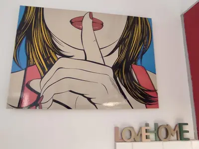 a painting of a hand holding up a finger at Apartment Glyfada Athens at One o One Seven, bright and spacious apartment located on the first floor with no elevator in Athens