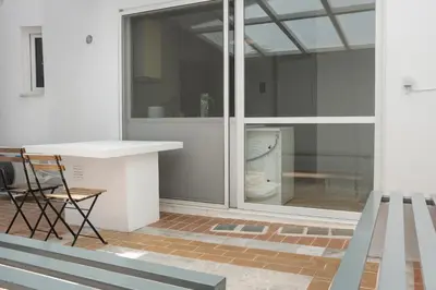 a bathroom with a toilet inside of a building at Athens Apartment on Lycabettus Hill with Rooftop View Access in Athens