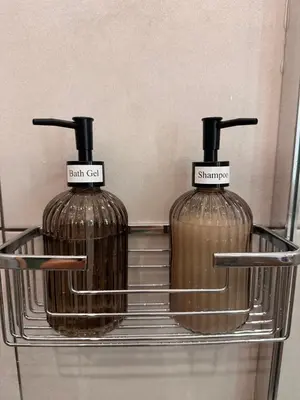 two bottles of fire extinguishers sitting on a shelf at National Garden and Panathenaic Stadium area Moden Cozy Studio A in Athens