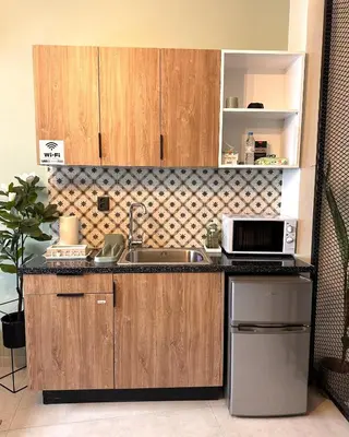 a kitchen with a sink and a microwave at National Garden and Panathenaic Stadium area Moden Cozy Studio A in Athens