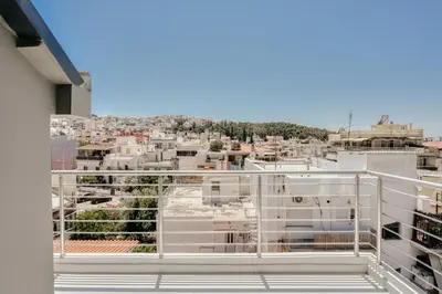 a balcony with a view of a city at Ayla Studio Athens in Athens