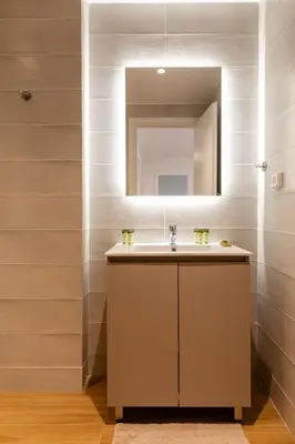 a bathroom with a sink and a mirror at Urban Athens - One Bedroom #8 in Athens