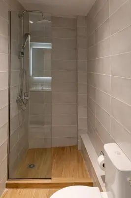 a bathroom with a shower with a glass door at Urban Athens - Two Bedroom #9 in Athens