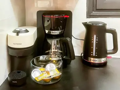 a coffee maker and a blender on a counter at Beachside Retreat in Glyfada in Athens