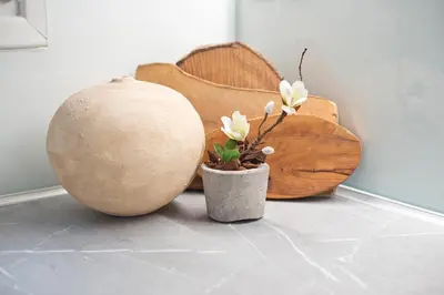 a couple of vases sitting on a floor with flowers at Aether Athens Luxurious Fully Renovated Apt in Athens