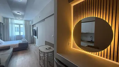 a hotel room with a sink and a mirror at Monastiraki 303 SuperHost Hub in Athens
