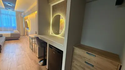 a bathroom with a vanity and a mirror in a room at Monastiraki 303 SuperHost Hub in Athens