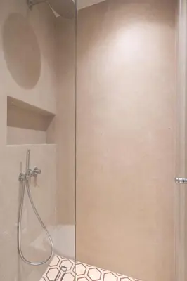 a shower with a glass door in a bathroom at Kolonaki Luxury Studios in Athens