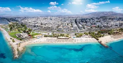 an aerial view of a beach and a city at Secret Garden by Acropolis - Athens Central Gem in Athens