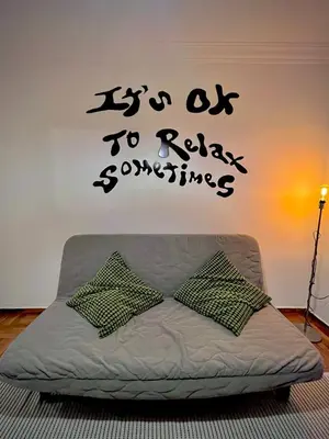 a bed with two pillows in a room at Apartment in the center of Athens! in Athens