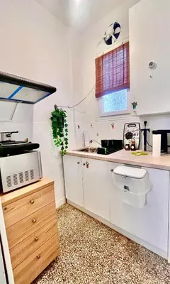 a kitchen with white cabinets and a sink at Apartment in the center of Athens! in Athens