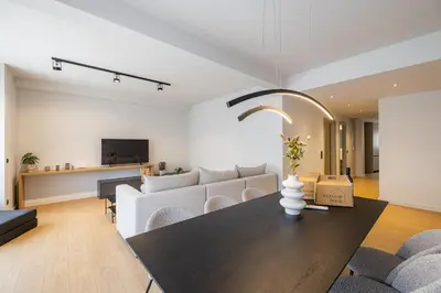 a living room with a couch and a table at Rooms151 Premium Suite in the Center of Athens 4th floor-8 in Athens