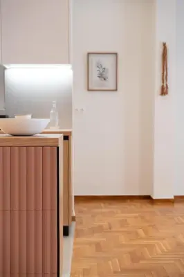 a kitchen with a counter with a bowl on top of it at RoomsByRamez -Chill Bright Stay- -Central Athens- in Athens