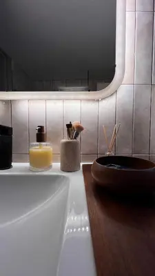 a bathroom with a sink and a mirror at Acropolis Sunset Paradise in Athens