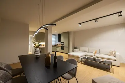 a living room with a table and a couch at Rooms151 Premium Suite in the Heart of Athens 4th floor-9 in Athens