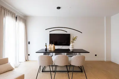 a dining room with a black table and chairs at Rooms151 Premium Suite in the Heart of Athens 4th floor-9 in Athens