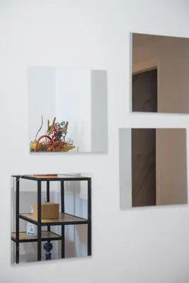 a table with a basket on a shelf in a room at The Athenian Chic in Athens