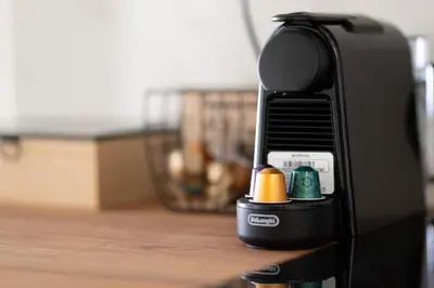 a close up of a coffee maker on a table at Modern Rooms Pagrati in Athens