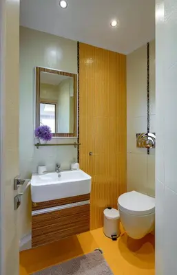 a bathroom with a sink and a toilet and a mirror at Sky Suite with View & Jacuzzi in Athens