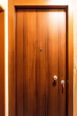 a wooden door with a handle in a room at Kerameikos Acropolis view in Athens