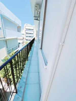 a stairway leading to a balcony of a building at City Center 2-Bedroom Sun home in Athens