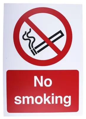 a red no smoking sign with a no smoking symbol at The George in Piraeus