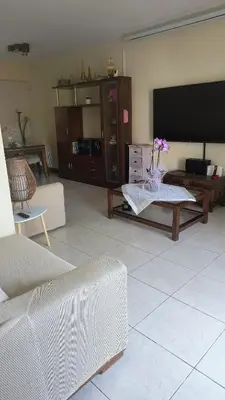 a living room with couches and a large flat screen tv at John & Mary's House Kalivia Near Sea & Athens Airport in Kalívia Thorikoú
